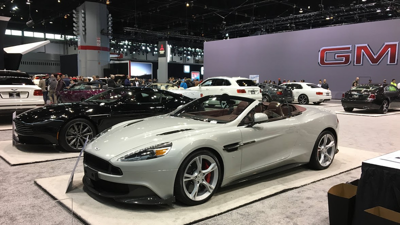 Aston Martin Vanquish S Volante, with a sticker price of $302k. Too much for such a dated, if gorgeous, car.